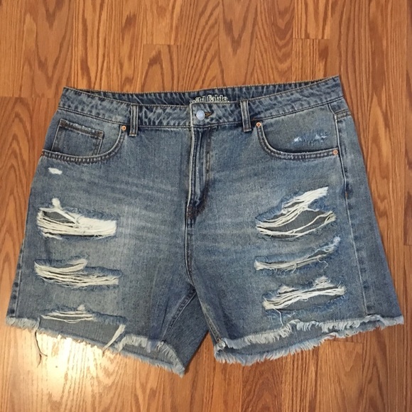 Torn jean shorts